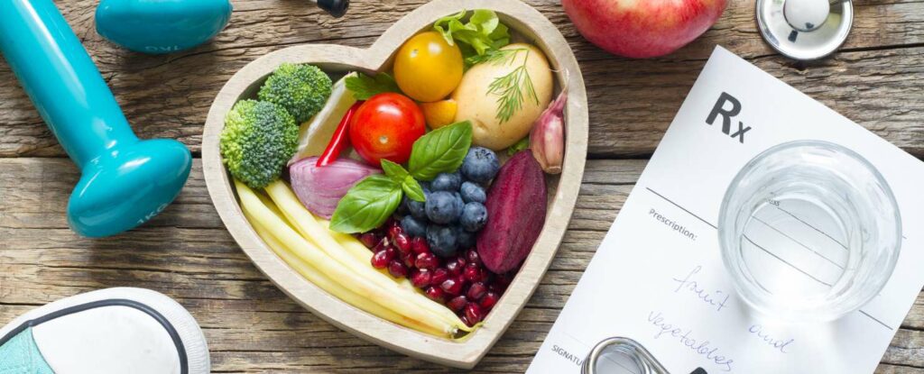 image of vegetables and weights symbolizing a healthy lifestyle 