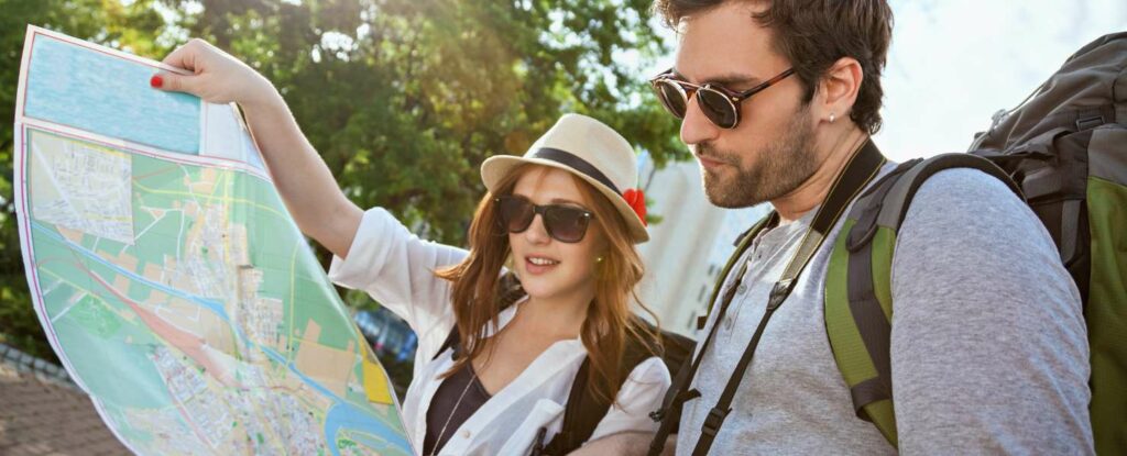 tourists protecting themselves by being vigilant of the bird poop scam