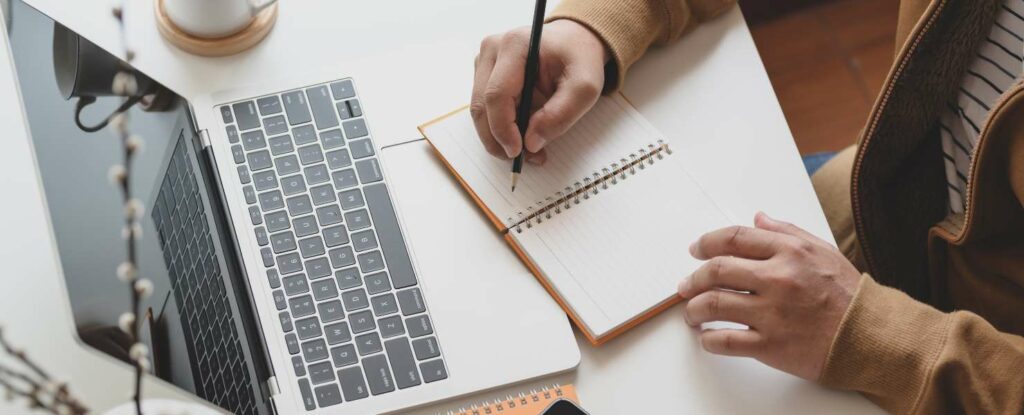 person preparing to write an obituary